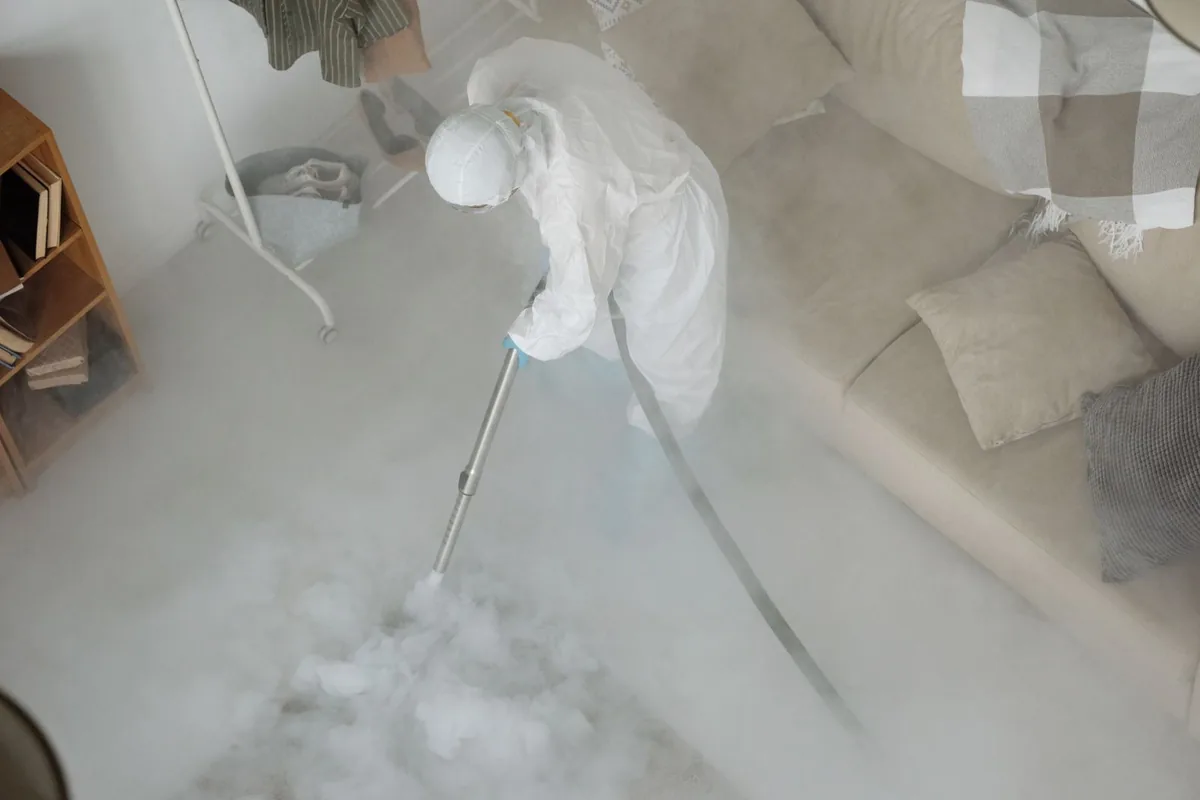 Biohazard cleanup technician in protective equipment, Wise, VA
